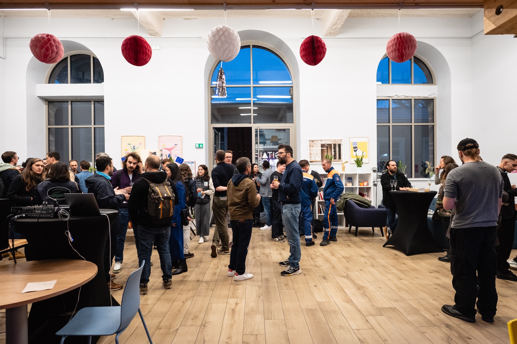 A packed hall at the Winners' Evening, guests in conversation